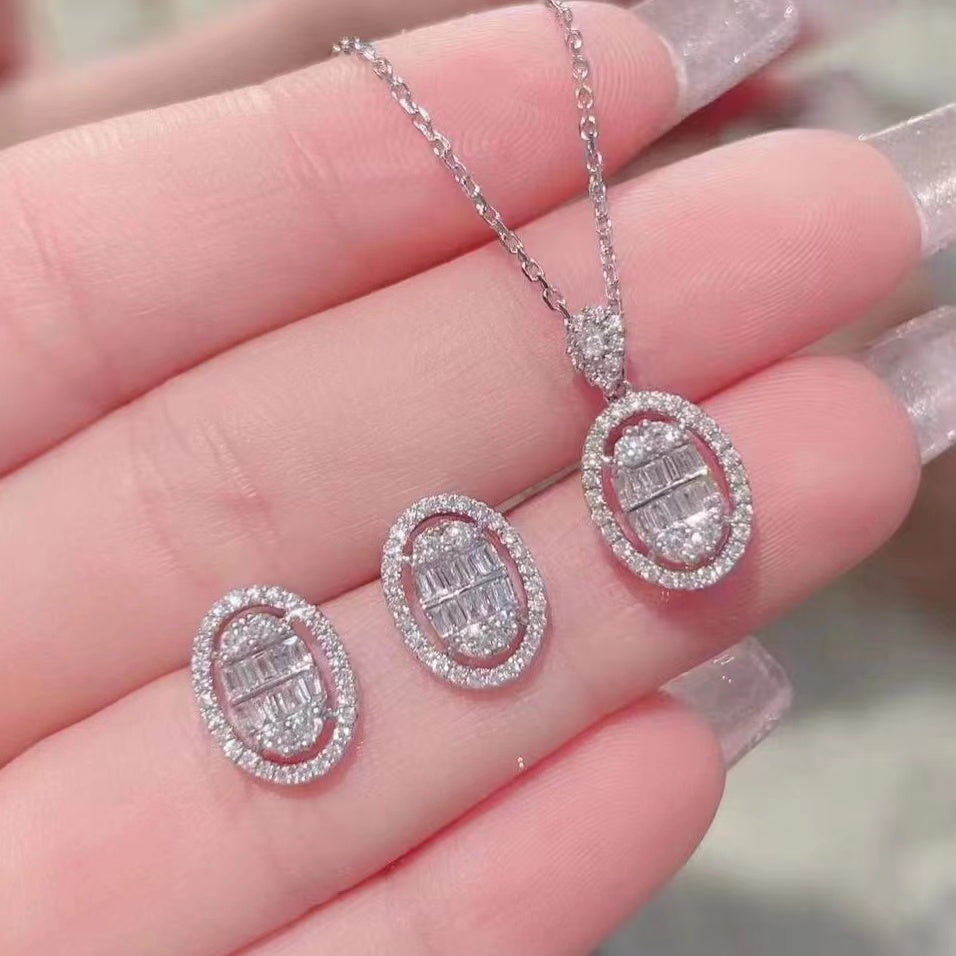 Oval-Shaped Diamond Frame Pendant Necklace and Earrings in 18K White Gold