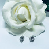 Oval-Shaped Diamond Frame Pendant Necklace and Earrings in 18K White Gold