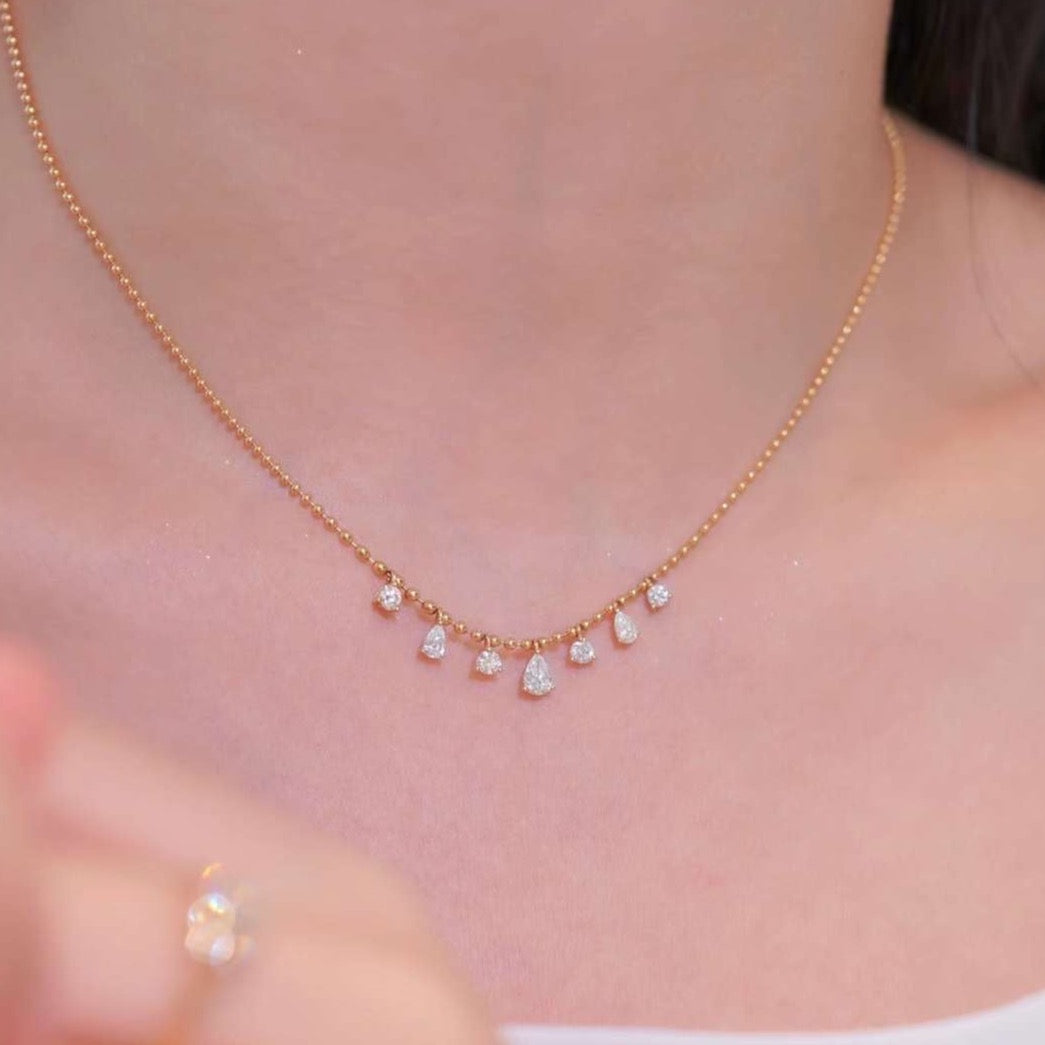 Round and Pear Shaped Diamond Droplet Necklace